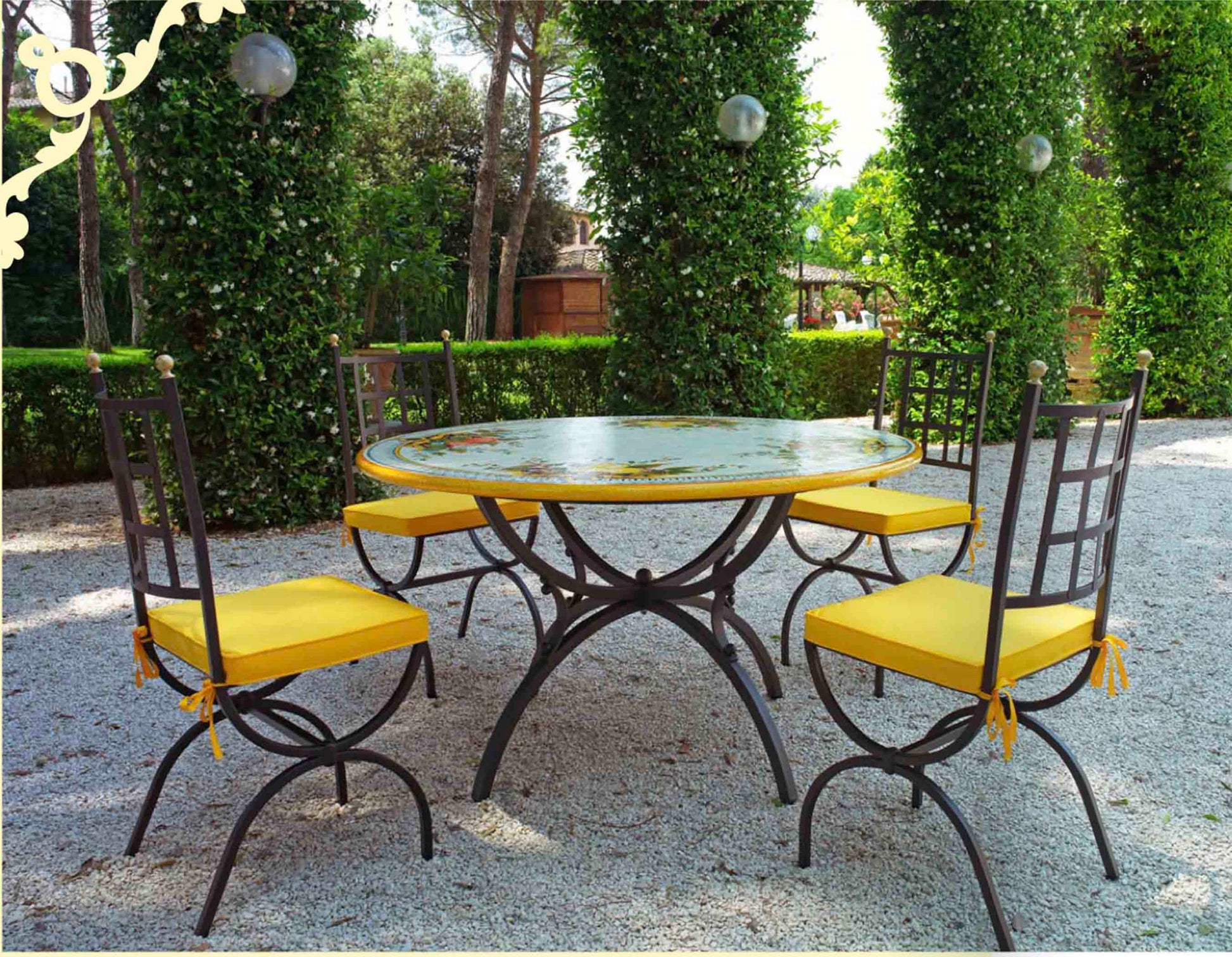 Italian hand-painted ceramic glazed round volcanic stone table in Capri Frutteto quadrant fruit design with a classic wrought iron base