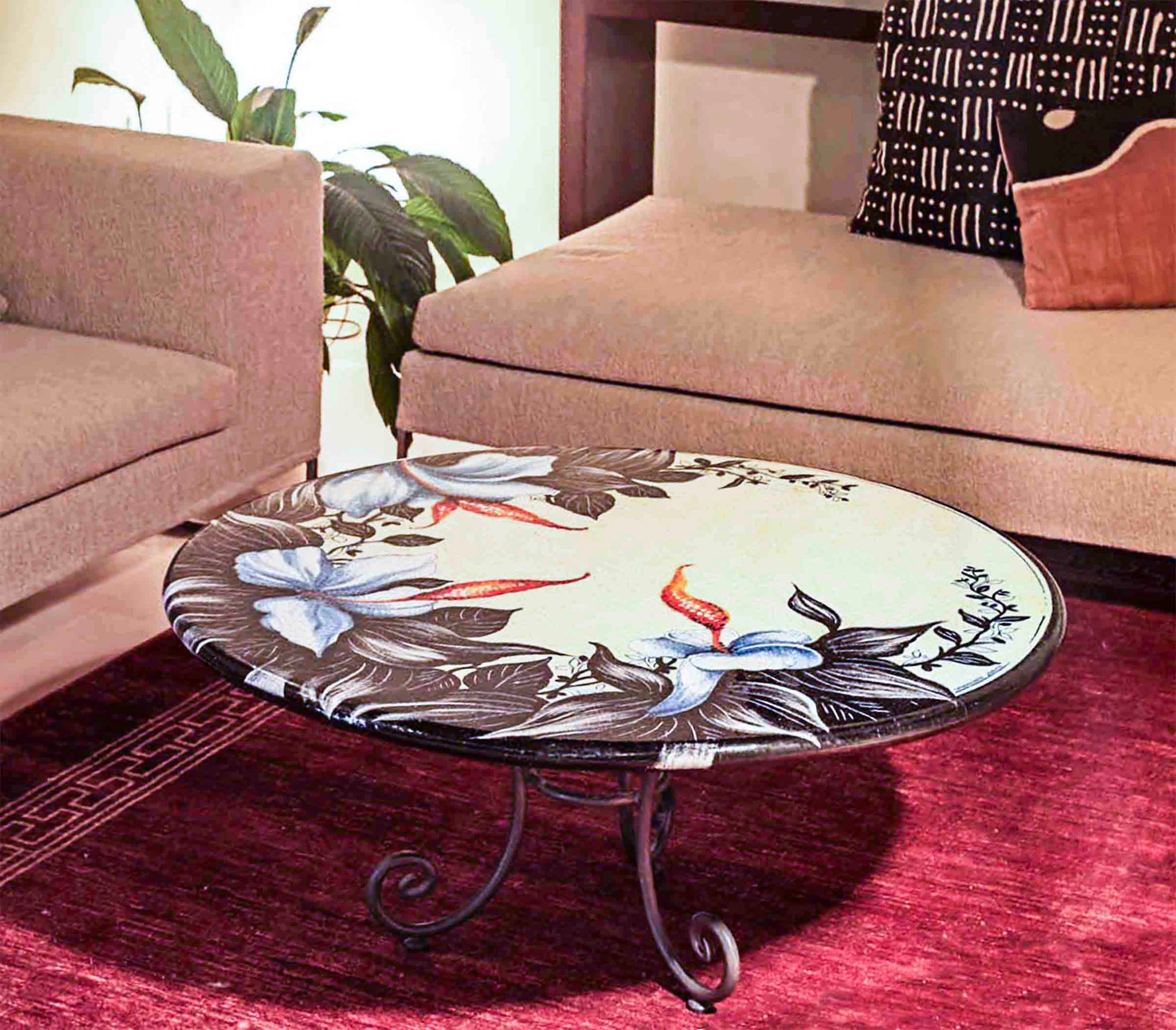 Italian hand-painted ceramic glazed round volcanic stone table in Ischia Esotica blue flower and black foliage design with a classic wrought iron base